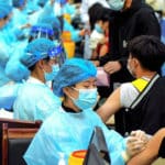 En Chine, pour promouvoir la vaccination, des chansonnettes et de la contrainte