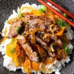 Recette de Wok de boeuf sauté aux oignons