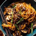30 Minute Saucy Ginger Sesame Noodles with Caramelized Mushrooms.