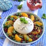 Burrata et oranges grillées, pistaches, menthe et grenade