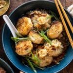 Sesame Chicken Dumplings in Spicy Broth with Garlic Crisps. - Half Baked Harvest